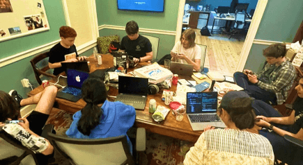 teens collaborating on tech products